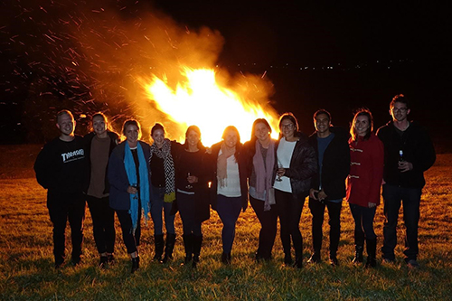 Murwillumbah students share the warmth around a bonfire 