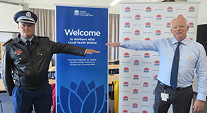 Northern NSW Local Health District Chief Executive Wayne Jones and Richmond Police District Crime Manager Detective Chief Inspector Cameron Lindsay demonstrate appropriate social distancing in the age of COVID-1